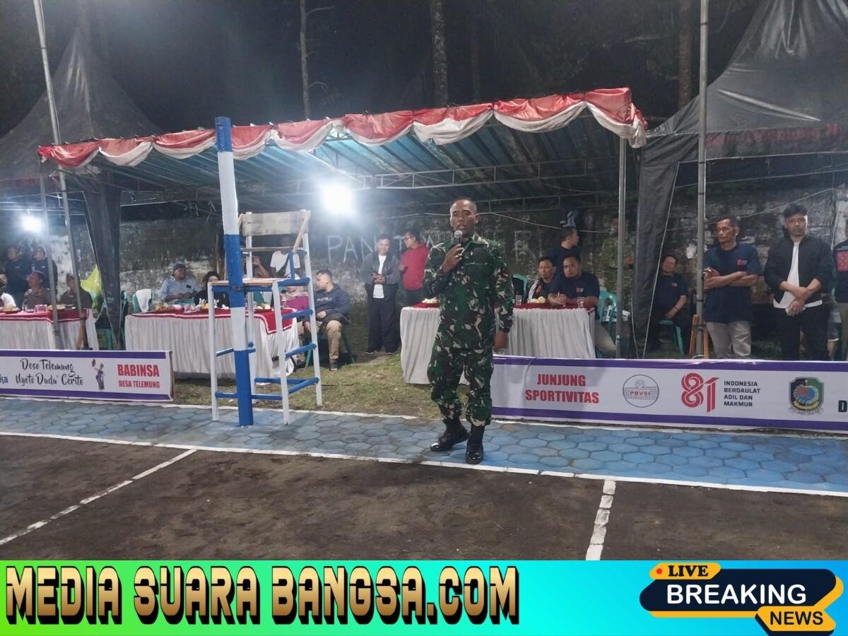 Saat Semangat Kemerdekaan Menyatukan Warga, Koramil 0825-21 Kalipuro Hadir Mengawal Turnamen Voli Gala RT di Telemung