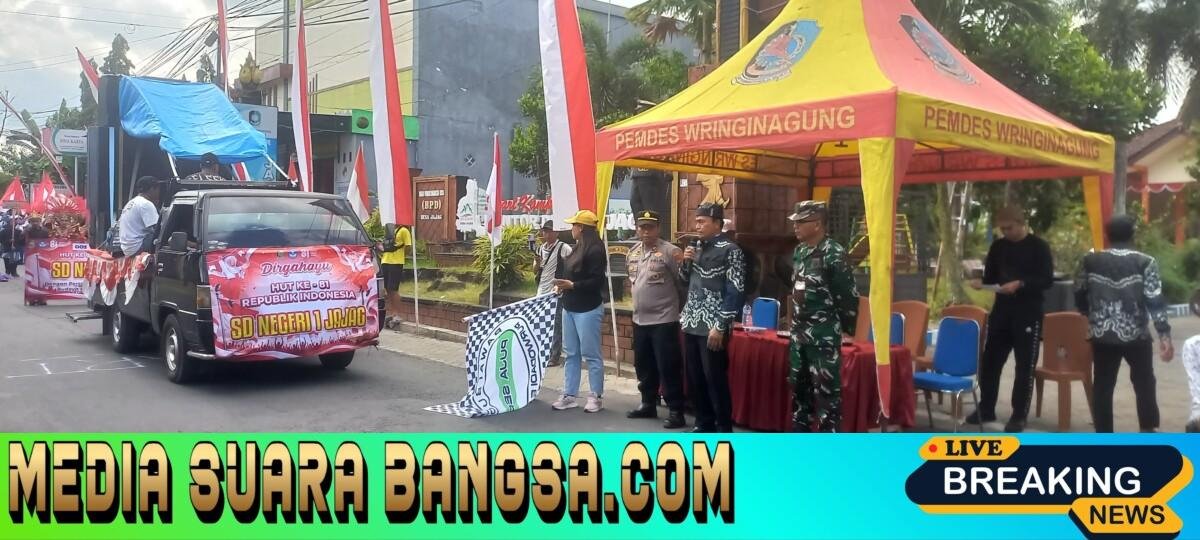 Babinsa Desa Jajag Koramil 0825/06 Gambiran Lepas pawai Budaya desa Jajag